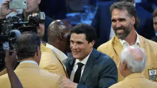 Kuechly Emphasizes People, Joy Over Wins in Hall of Fame Speech