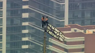 Peace-banner stunt at Empire State Building ends with custody