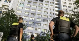Daring Berlin rescue as resident leaps from 11th floor during 18-story high-rise blaze