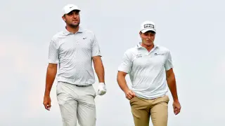 Hovland and Scheffler share 21-under lead as weather delays finish at Travelers Championship