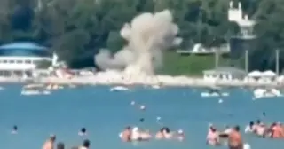 Drone strike on Russian beach spurs blame game between Moscow and Kyiv