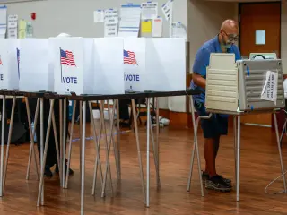 DOJ Deploys Federal Monitors to Michigan Polls Amid Partisan Warnings