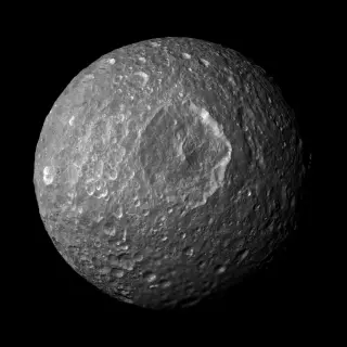 Mimas hides a young global ocean beneath its ancient ice