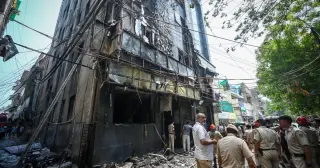 Deadly Delhi hotel fire leaves at least 21 dead as residents leap from windows