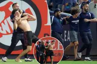 Three Fans Tackled After Field Invasion Halts Yankees-Mariners