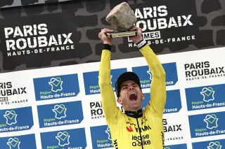 Van Aert's Cobblestone Triumph: A Victory Dedicates to a Fallen Teammate