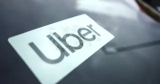 Uber trims 3,300 jobs in largest layoff since 2020 amid robotaxi push