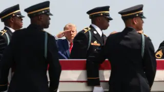 Trump honors four fallen troops as Iran conflict escalates