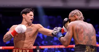 Garcia Retains WBC Welterweight Belt with Round-2 KO of Benn