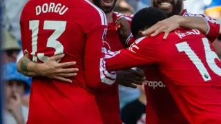 United clinch top-three with 2-0 win over Brighton on final day