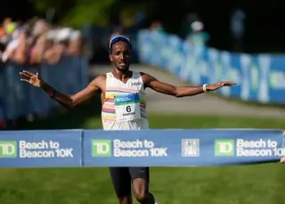 Samuel and Kosgei Seize TD Beach to Beacon 10K Titles