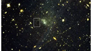 Hubble uncovers first external globular-cluster stellar stream, a new testbed for dark matter