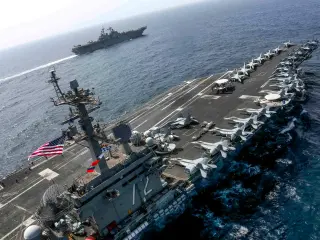 Trump brushes off worries as USS Lincoln endures record-long deployment amid Iran tensions