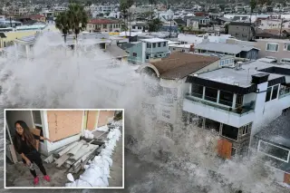Monster swells flood Long Beach after seawall breach, wiping out cars and forcing evacuations