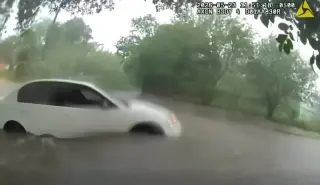 Video captures infant rescue from waterlogged Texas car during floods