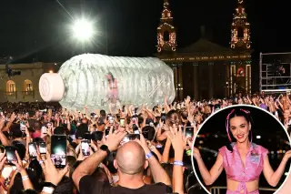 Katy Perry becomes stuck inside giant inflatable bottle during Malta show