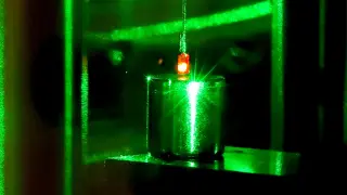 Quantum Spin Nudges Centimeter-Scale Diamond, Bridging Quantum and Classical Physics