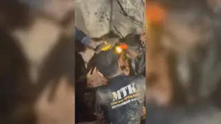 Laos cave rescue: first evacuee pulled out as two villagers remain missing