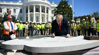 Trump Unveils White House Upgrades, Signs Granite for Helipad