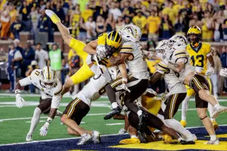 No. 16 Michigan edges WMU on dramatic last-second Hail Mary