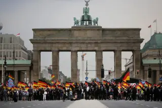 AfD's First State Parliament President Elected Amid Migrant Anxiety and Political Firewalls