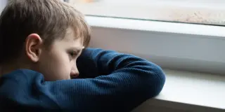 Youth trauma accelerates aging clock and shifts gaze away from eyes