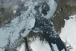 Arctic Ice Island Survives Narrow Collision With Joe Island
