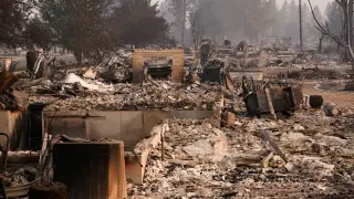 Spokane wildfire survivors recount loss amid mass evacuations and ongoing flames