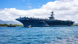 US deploys third carrier and extra troops to Middle East ahead of elections