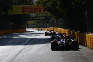 Russell Edges Verstappen in Baku as Norris Crashes Out
