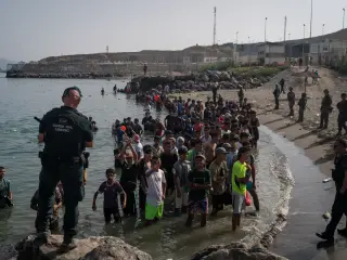 Spain seals Ceuta shore with floating barrier after deadly migrant surge