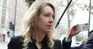 Critics Debate Truth and Deception in Holmes Documentary