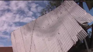 Santa Fe residents describe rare EF-1 tornado damage and community cleanup