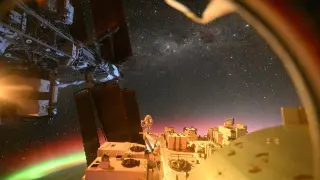 Aurora over Earth and Alpha Centauri: rare ISS vantage point