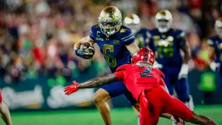 Irish erupt in second half to bury Badgers 41-13