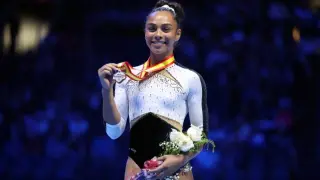 Rivera storms back from fourth to repeat as U.S. all-around champ