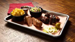 Dallas-Driven AA Adds Pecan Lodge BBQ to First Class Meals