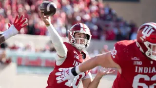 Out-of-bounds catch ends Indiana's 22-game streak as Ohio State survives with injured QB