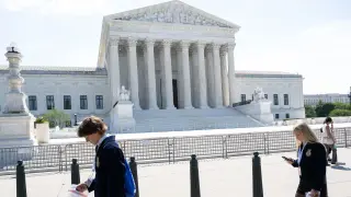 Dow tops 52,000 as SCOTUS rulings and Medicare drug coverage reshape markets