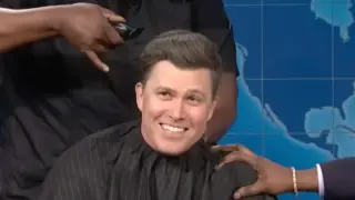 Colin Jost Survives a Live Haircut Moment on SNL's Weekend Update