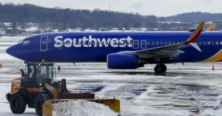 Southwest eases second-seat rule for larger travelers, offering a free extra seat when available