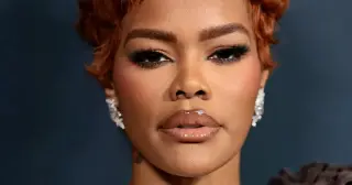 Teyana Taylor Debuts Waist-Length Curls to Complement Couture at Women In Music