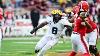 Lions leap up to grab Michigan edge Derrick Moore at No. 44