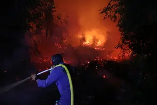 Indonesia expands aerial firefighting as regional haze spreads