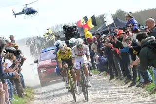 Pogačar's cobbled bid falls short as Van Aert edges him out at Paris-Roubaix