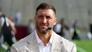 Carton Blasts Torre Over Tebow Scandal; Tebow Suspends Life Surge Ties