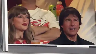 Taylor Swift Teaches Tom Cruise Football at Chiefs Game