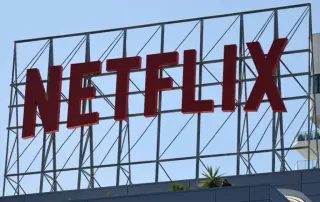 Netflix tumbles as Hastings steps aside, signaling a changing of the guard