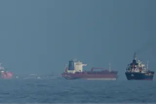Iranian gunboats fire at tanker as Hormuz transit rules tighten