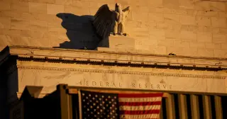 Markets Rally as Fed Hikes Rates and Oil Slips